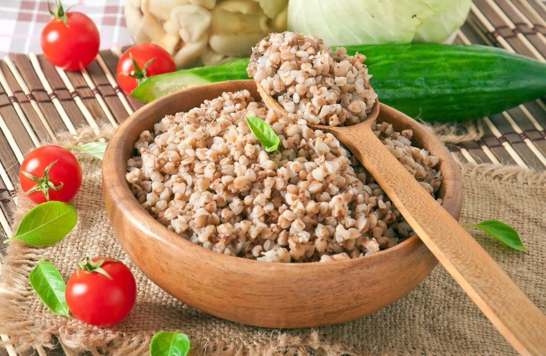 Buckwheat porridge with fresh vegetables on the buckwheat diet menu for weight loss. 